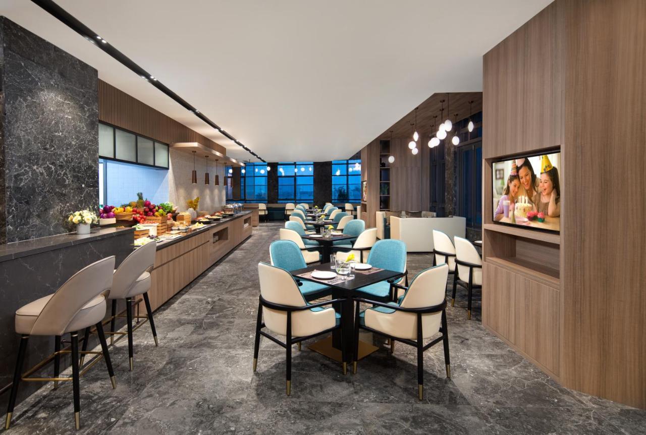 Rezen Hotel Zhuhai Hengqin Border And Exhibition Center Branch ภายนอก รูปภาพ